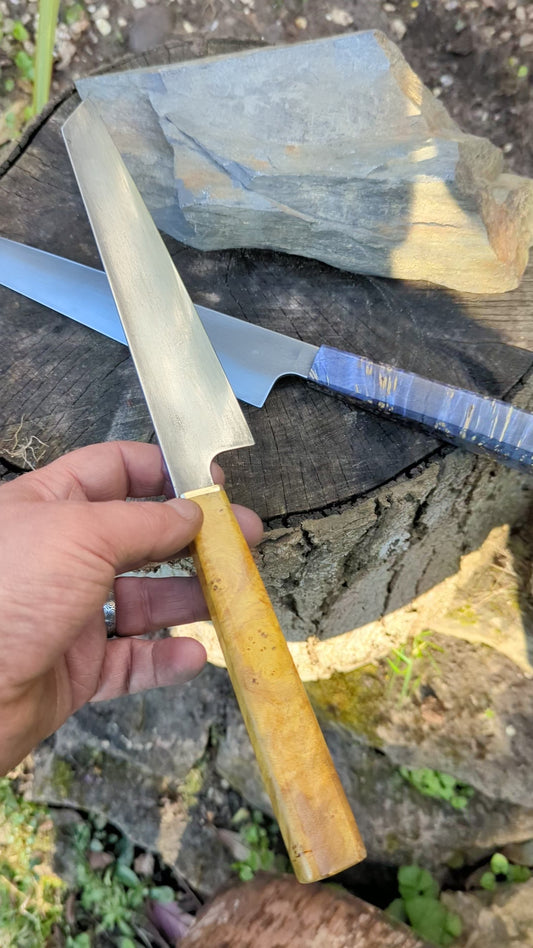 Hand made 8" ApexUltra carbon steel. Ash burl handle