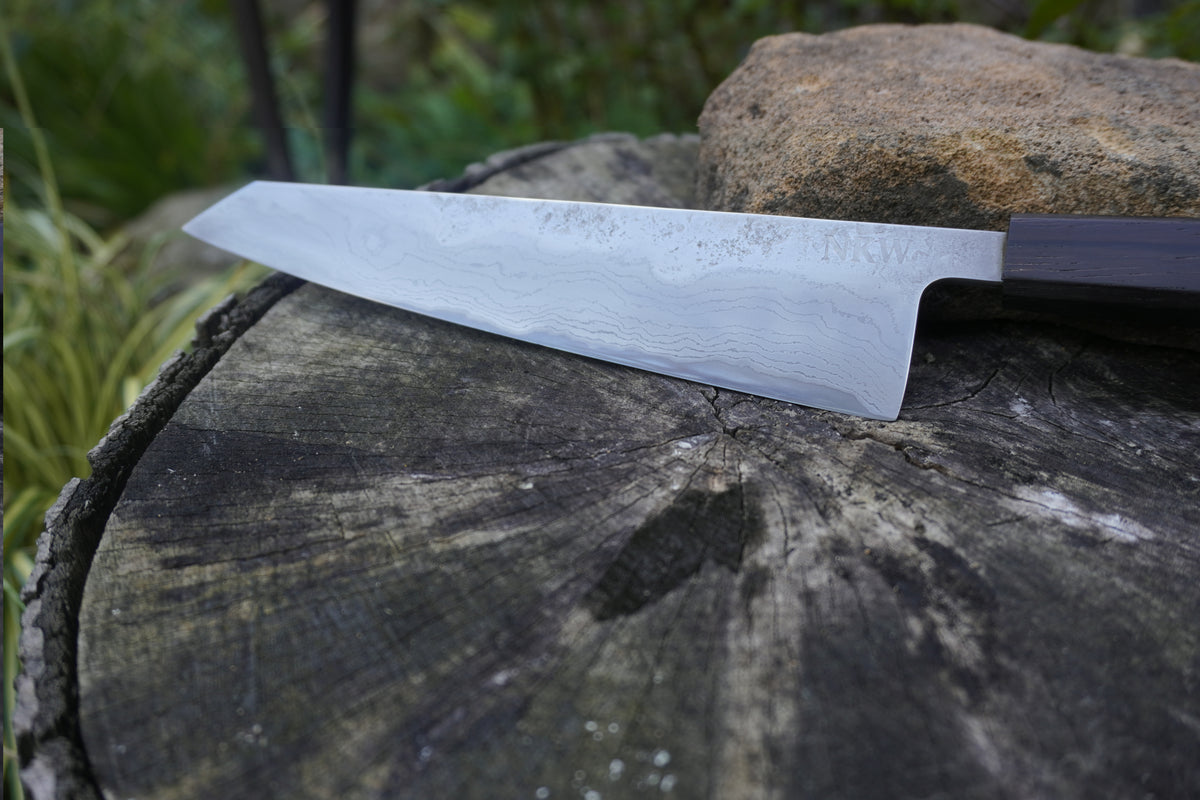 Hand Made Kiritsuke 185mm. Takefu V-Toku2 Core Suminagashi with carbon cladding.  Repurposed Rosewood