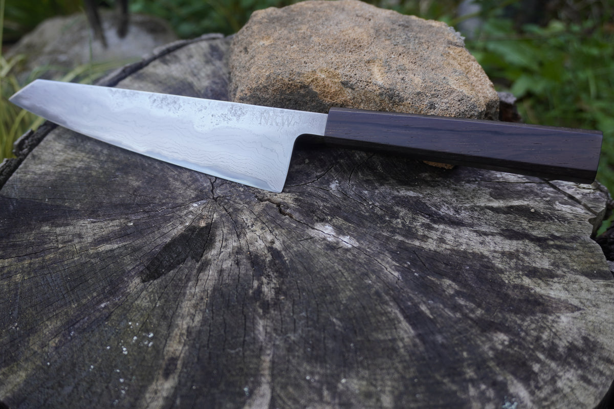Hand Made Kiritsuke 185mm. Takefu V-Toku2 Core Suminagashi with carbon cladding.  Repurposed Rosewood