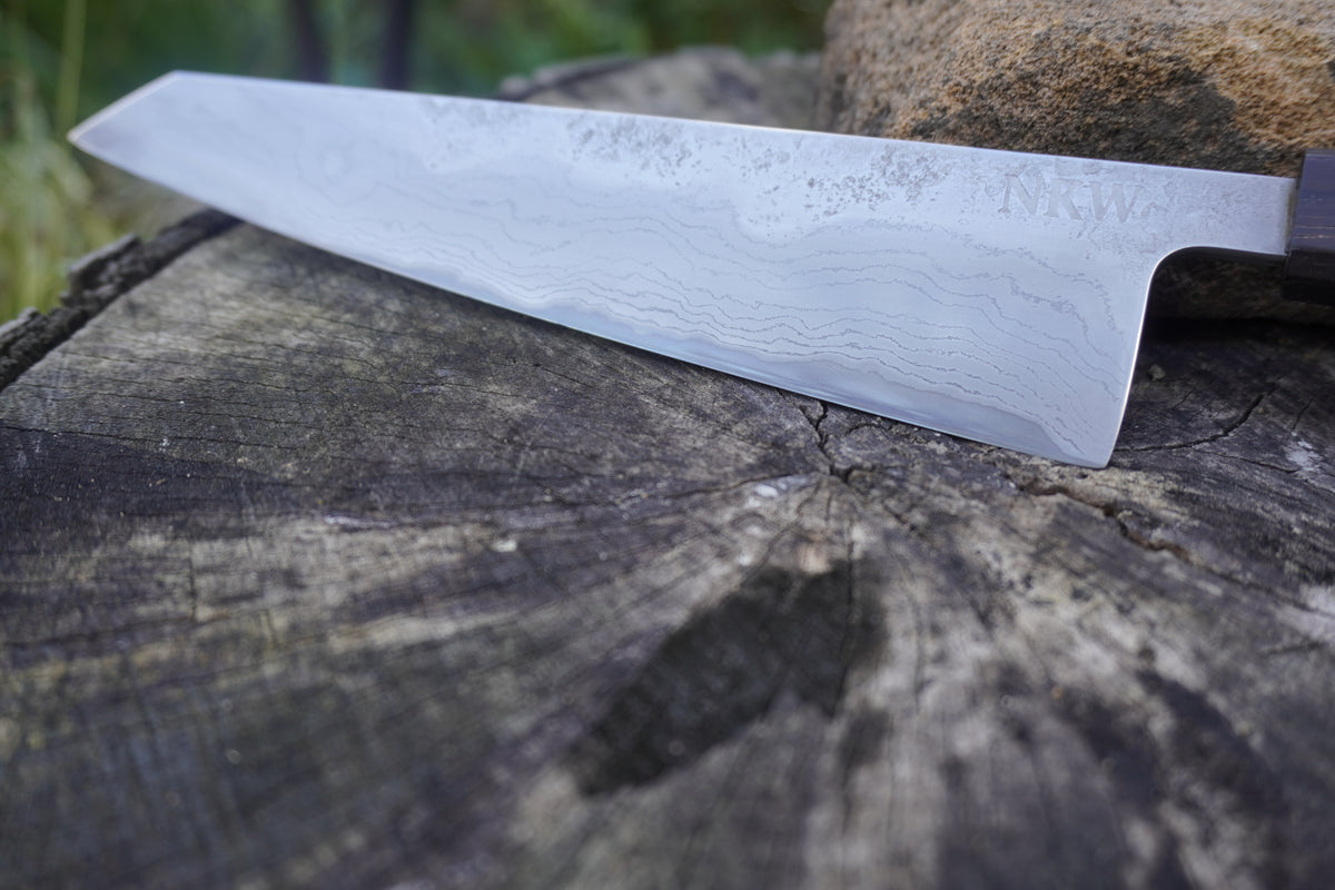 Hand Made Kiritsuke 185mm. Takefu V-Toku2 Core Suminagashi with carbon cladding.  Repurposed Rosewood