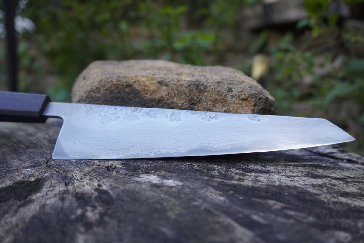 Hand Made Kiritsuke 185mm. Takefu V-Toku2 Core Suminagashi with carbon cladding.  Repurposed Rosewood