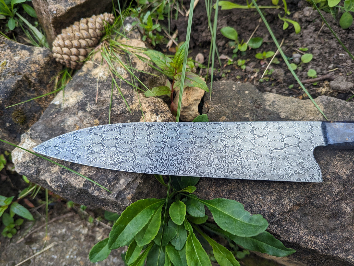 Handmade 9 ½" chef's knife, Hand-forged Rose garden Damascus. Amboyna burl handle