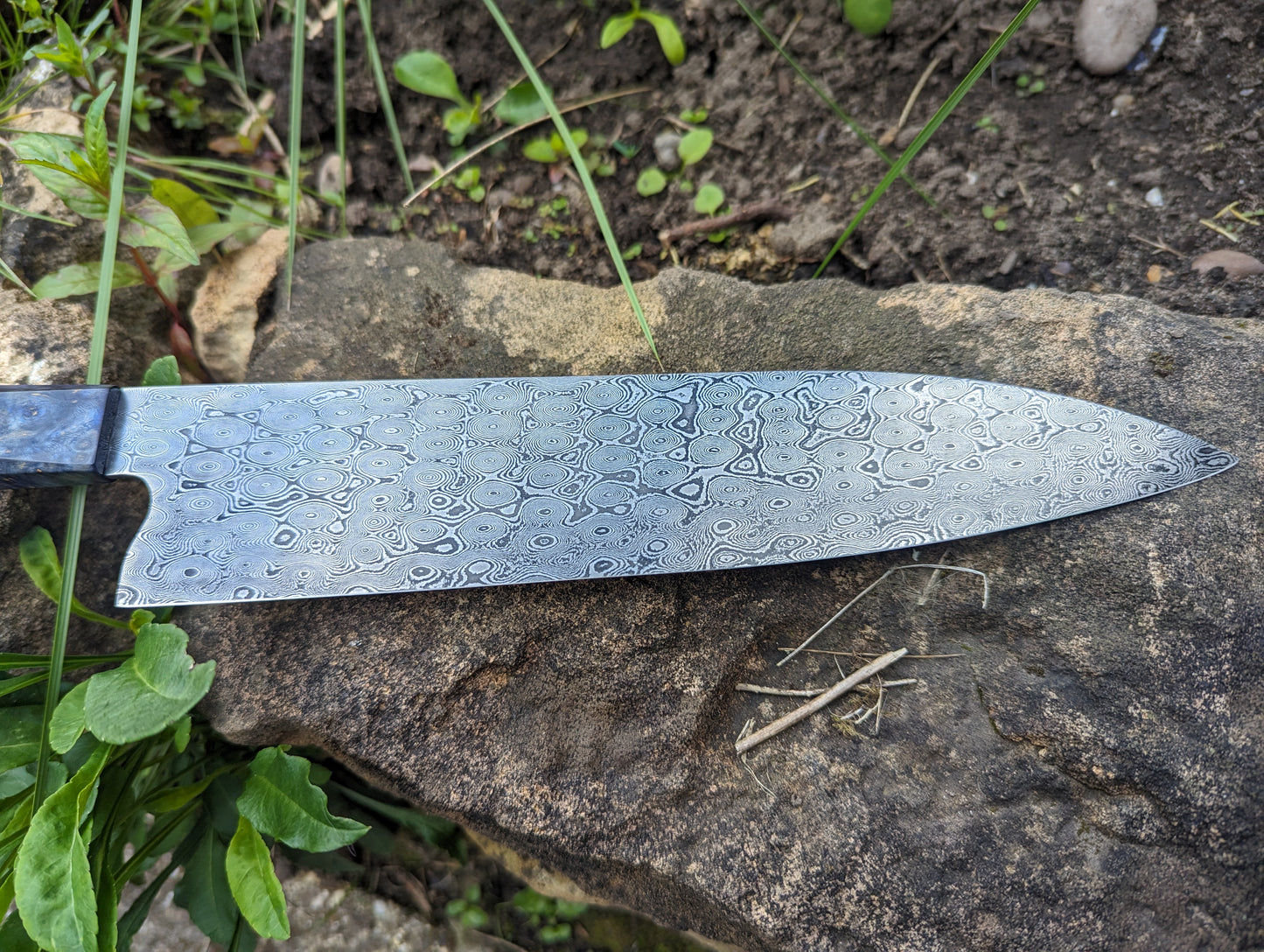 Handmade 9 ½" chef's knife, Hand-forged Rose garden Damascus. Amboyna burl handle