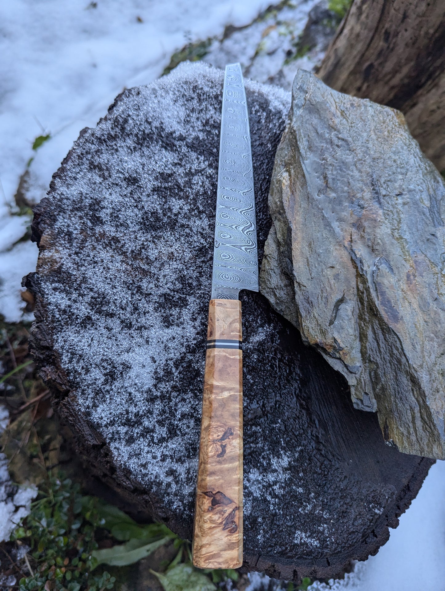 Handmade 7" utility / petty knife, Hand-forged ladder Damascus. chestnut burl with black G10 and nickel handle