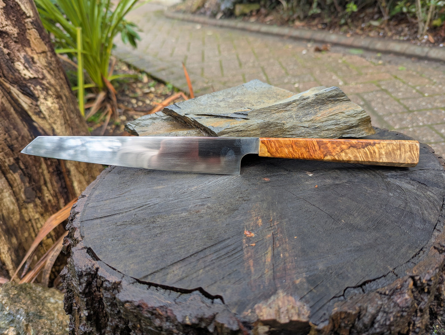 Hand made 7" Damasteel RWL34 stainless steel. Natural Amboyna burl