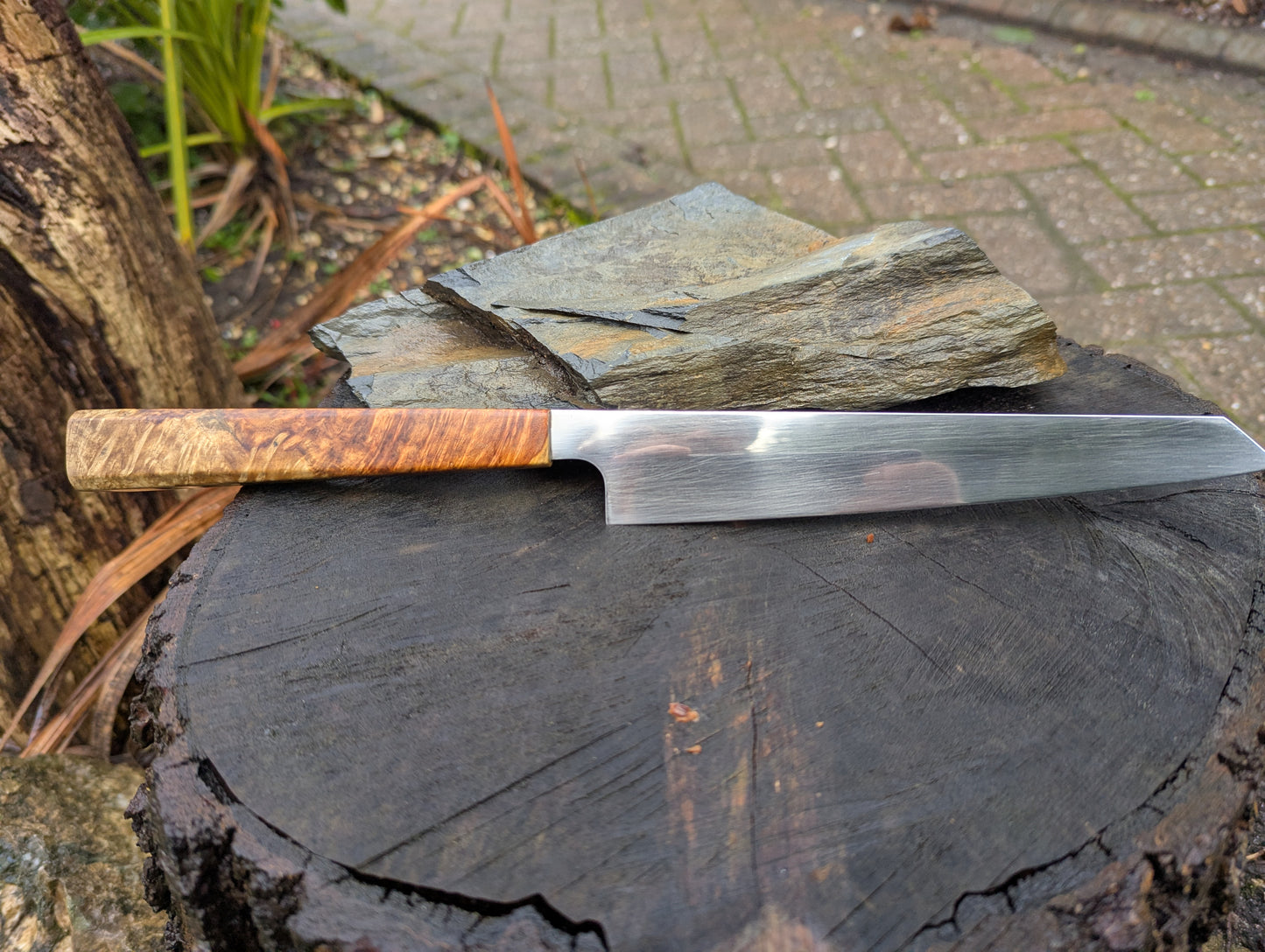 Hand made 7" Damasteel RWL34 stainless steel. Natural Amboyna burl