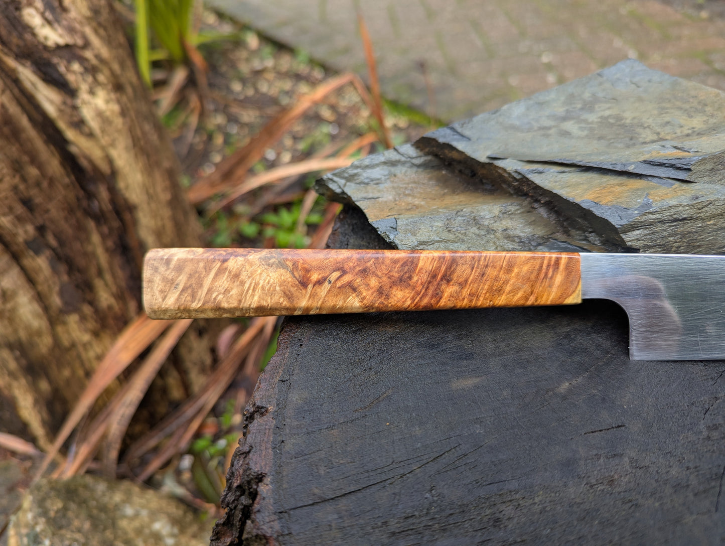 Hand made 7" Damasteel RWL34 stainless steel. Natural Amboyna burl