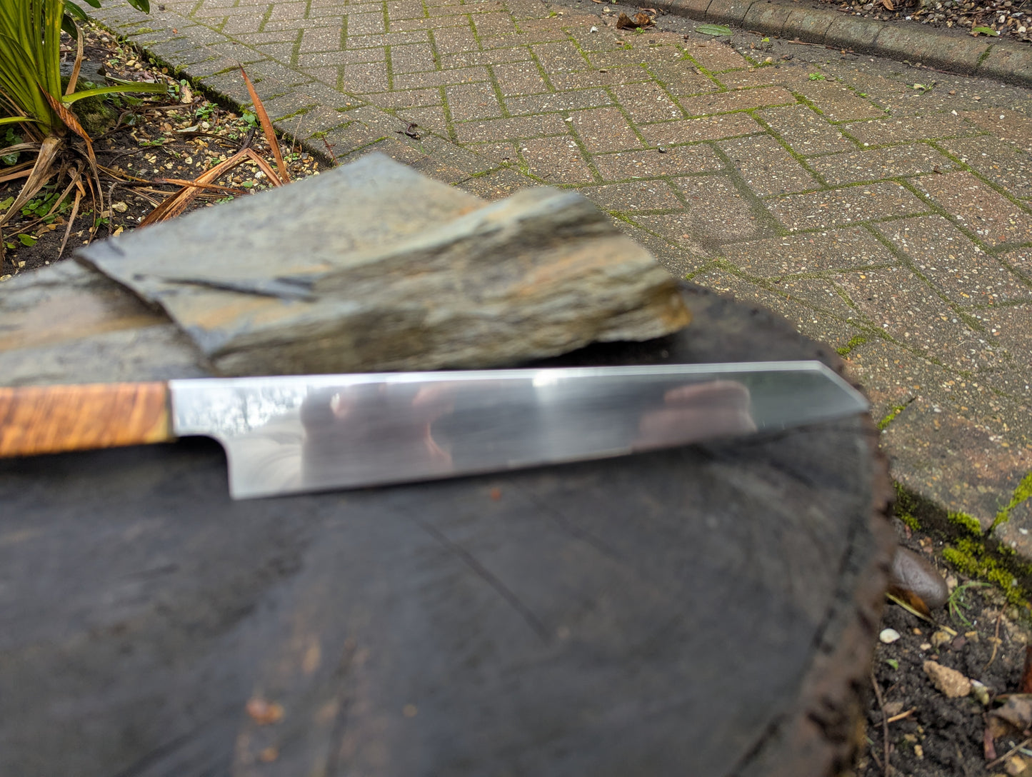 Hand made 7" Damasteel RWL34 stainless steel. Natural Amboyna burl