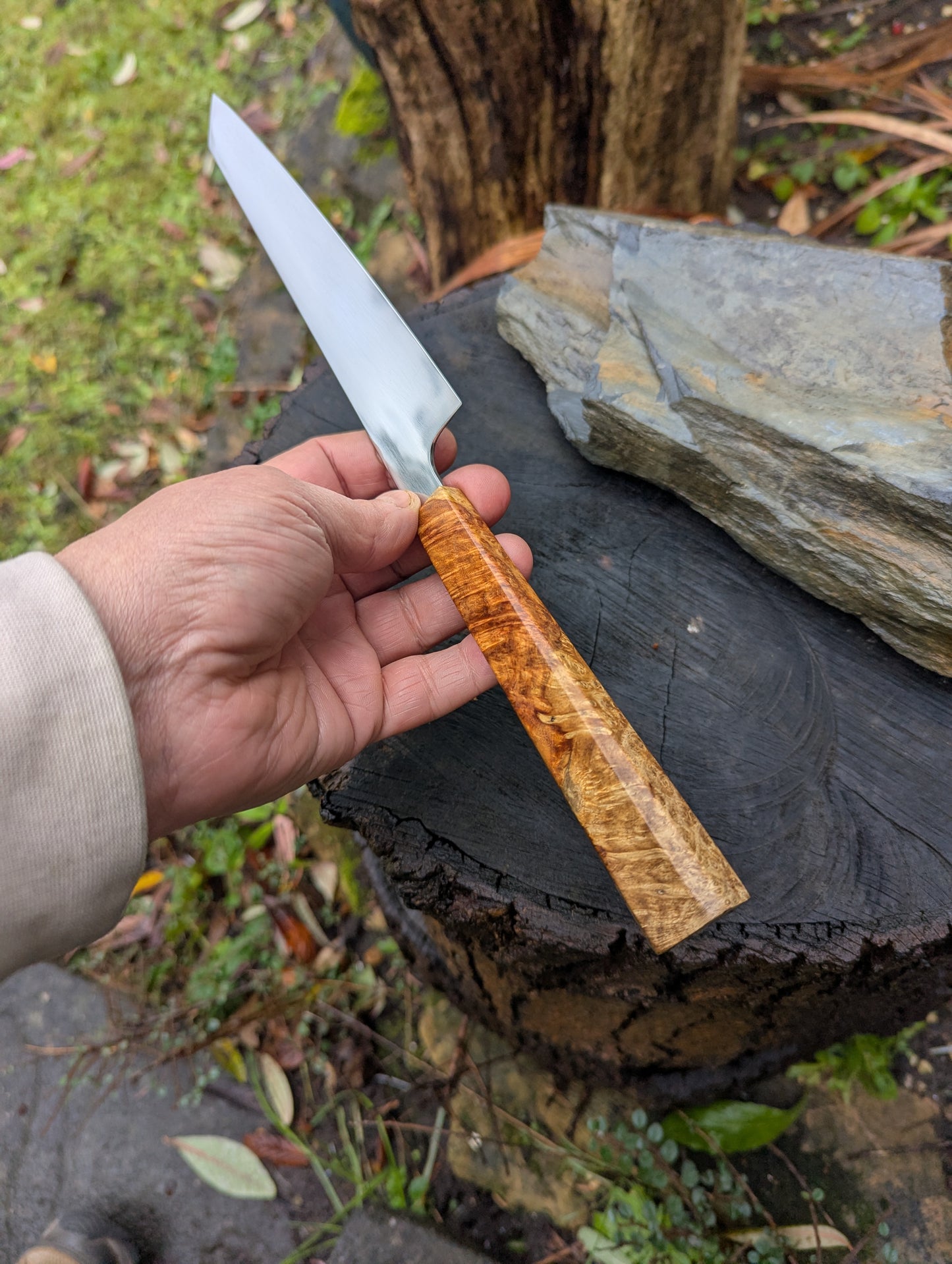 Hand made 7" Damasteel RWL34 stainless steel. Natural Amboyna burl