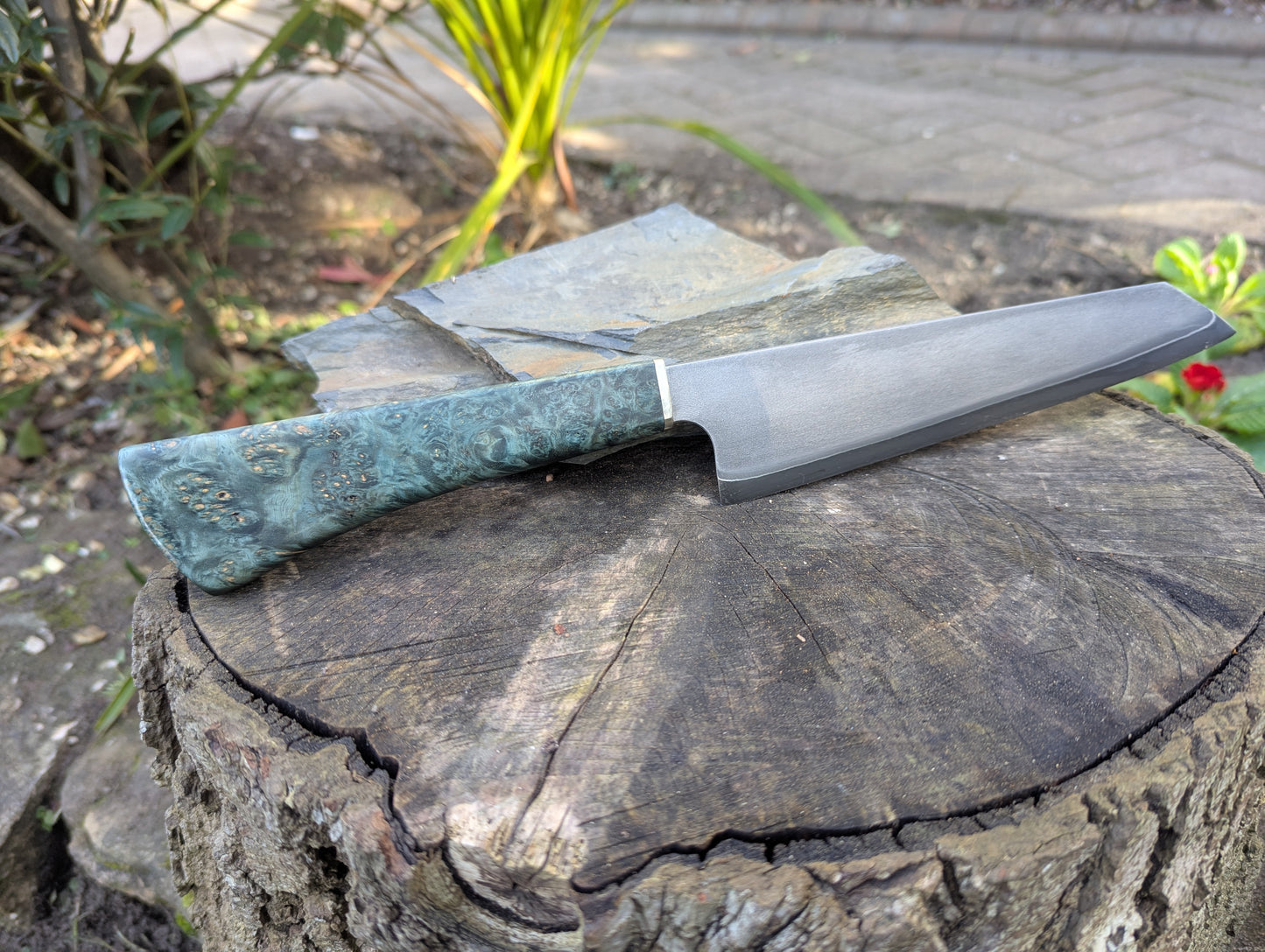 Hand made 8" Takefu super blue stainless clad San Mai. Amboyna burl with nickel silver