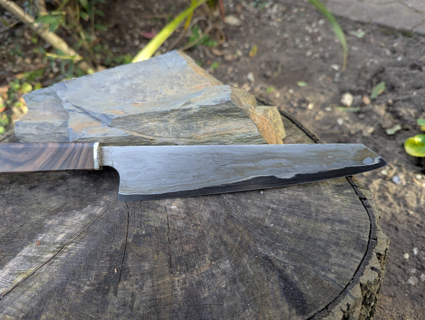 Hand made 8" carbon steel core and Wrought iron cladding with nickel San Mai. Turkish walnut with nickel silver