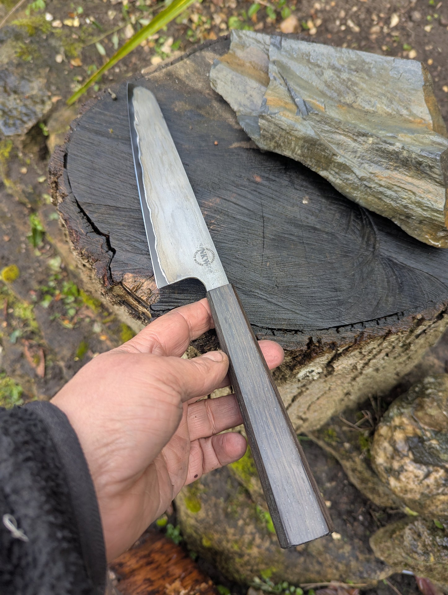 Hand made 8" carbon steel core and Wrought iron cladding with nickel San Mai. 5600 years old Bog Oak