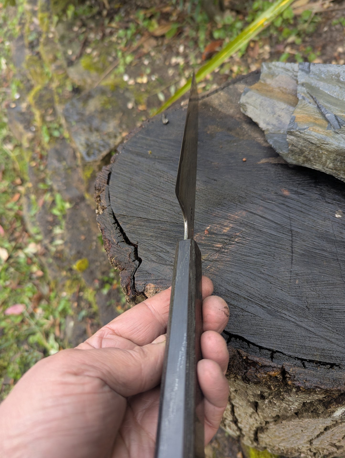 Hand made 8" carbon steel core and Wrought iron cladding with nickel San Mai. 5600 years old Bog Oak