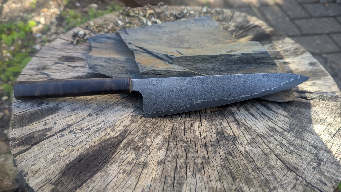Hand Made 170mm Carbon Steel Core and  Damascus Cladding. Walnut Burl Handle