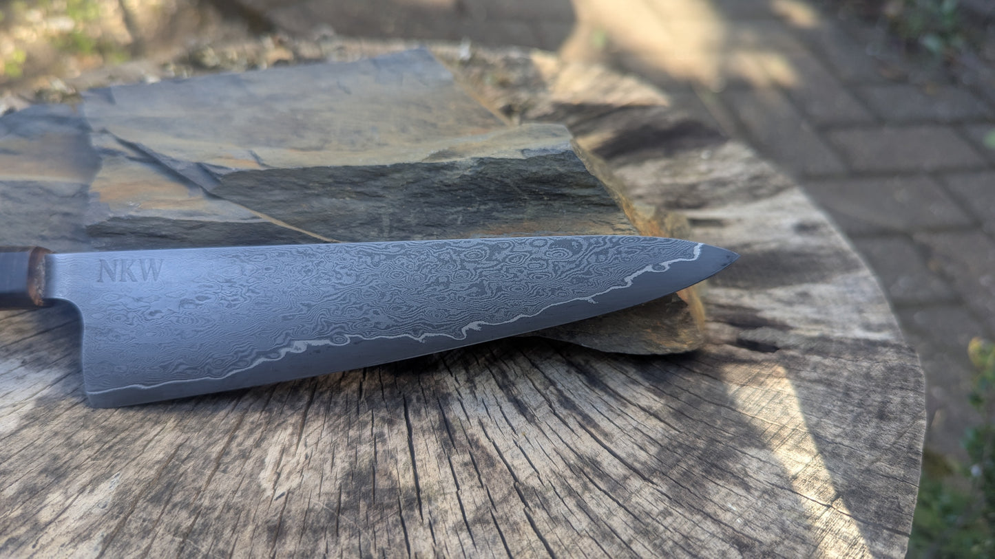 Hand Made 170mm Carbon Steel Core and  Damascus Cladding. Walnut Burl Handle
