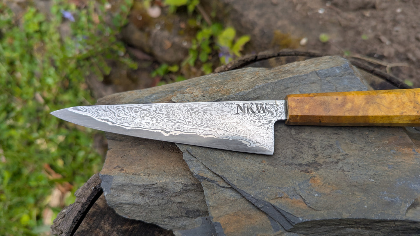 Hand Forged 125mm Petty. 80CRV2 San-Mai, 60 layers Damascus. Ash Burl Handle