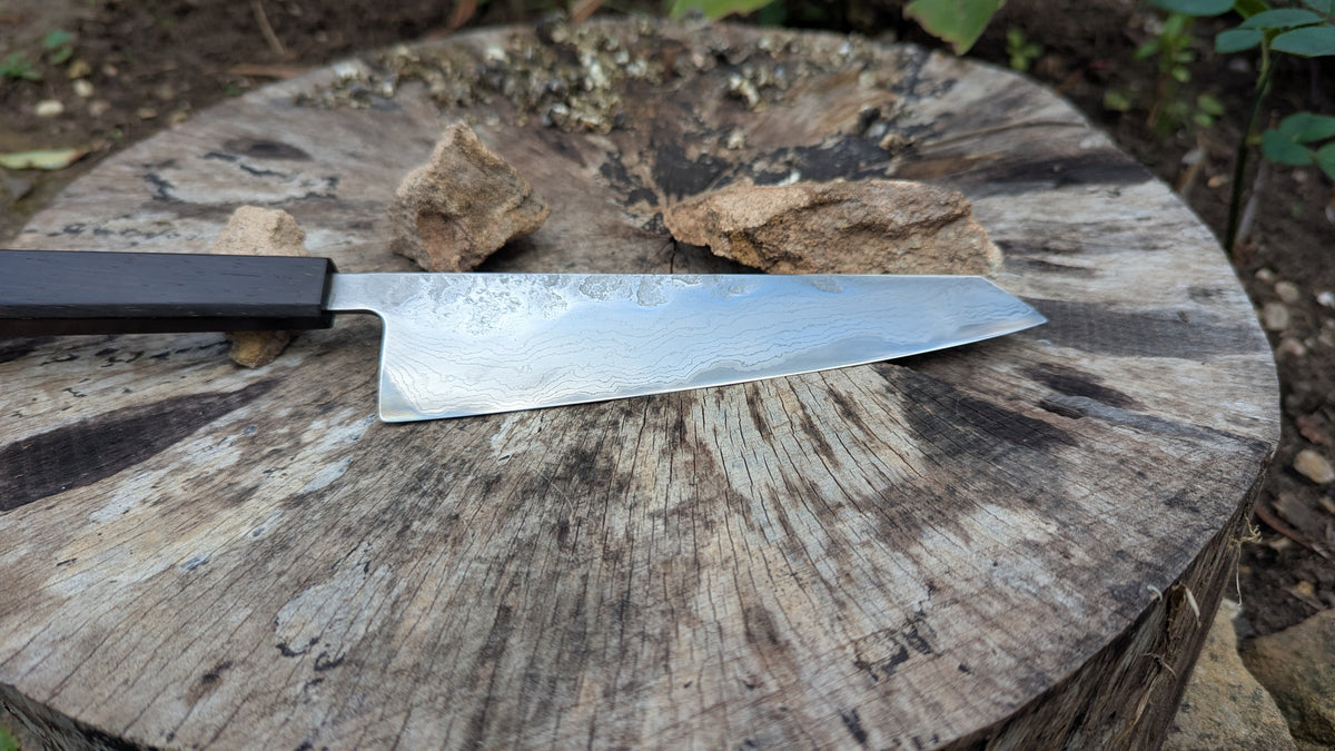 Hand Made Kiritsuke 185mm. Takefu V-Toku2 Core Suminagashi with carbon cladding.  Repurposed Rosewood