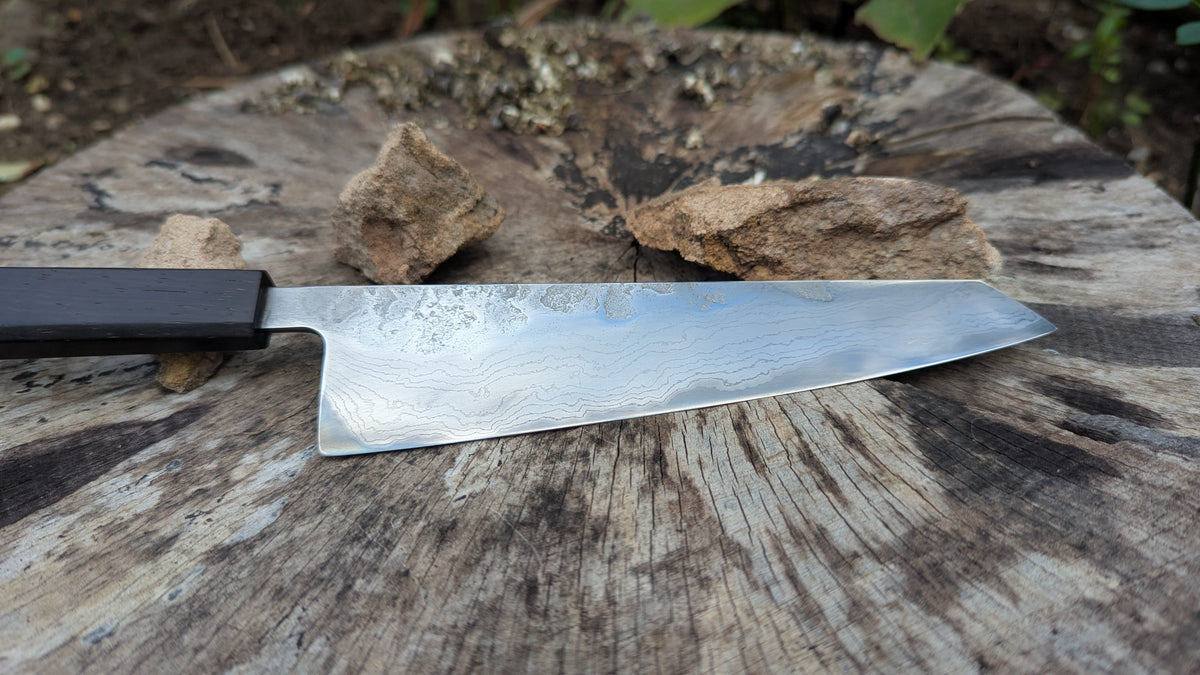 Hand Made Kiritsuke 185mm. Takefu V-Toku2 Core Suminagashi with carbon cladding.  Repurposed Rosewood