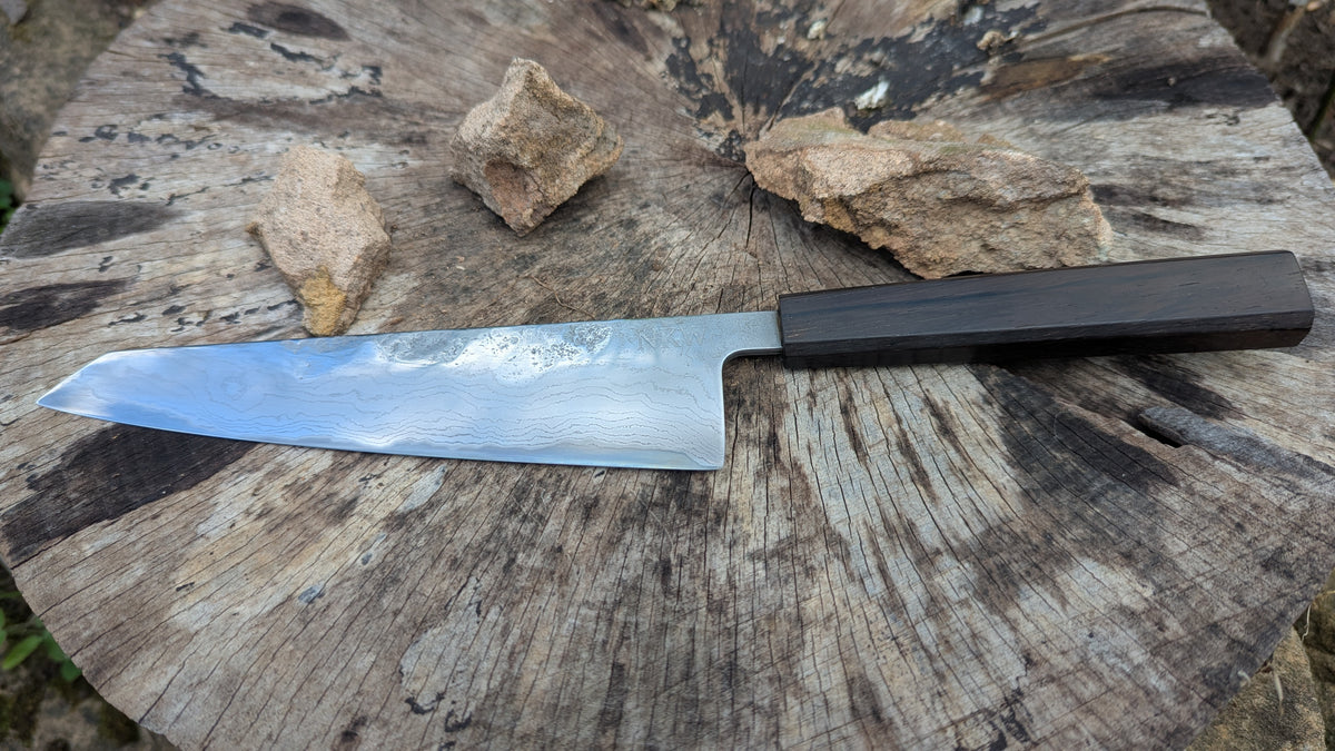 Hand Made Kiritsuke 185mm. Takefu V-Toku2 Core Suminagashi with carbon cladding.  Repurposed Rosewood