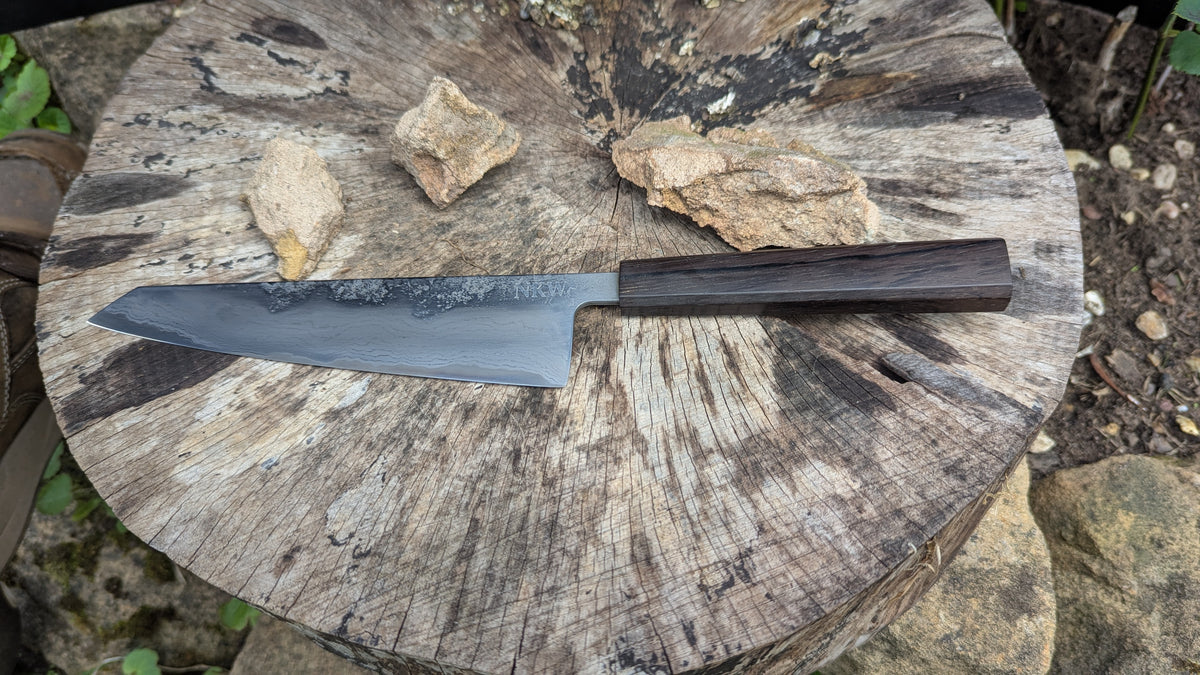 Hand Made Kiritsuke 185mm. Takefu V-Toku2 Core Suminagashi with carbon cladding.  Repurposed Rosewood