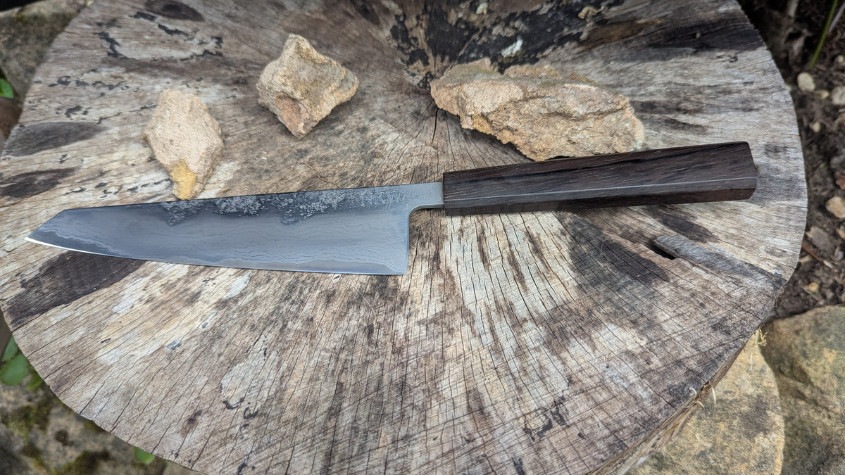 Hand Made Kiritsuke 185mm. Takefu V-Toku2 Core Suminagashi with carbon cladding.  Repurposed Rosewood