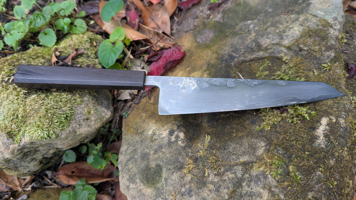 Hand Made Kiritsuke 185mm. Takefu V-Toku2 Core Suminagashi with carbon cladding.  Repurposed Rosewood