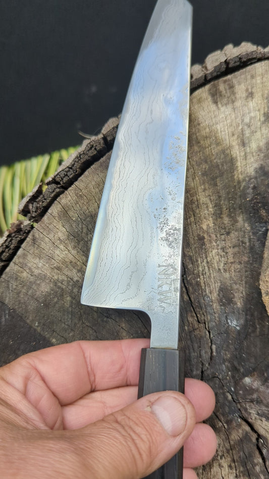 Hand Made Kiritsuke 185mm. Takefu V-Toku2 Core Suminagashi with carbon cladding.  Repurposed Rosewood