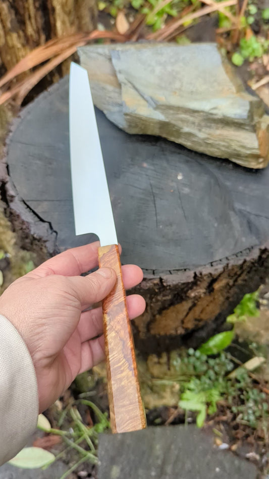 Hand made 7" Damasteel RWL34 stainless steel. Natural Amboyna burl